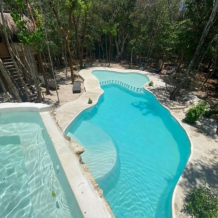 Aldea Maya-Ha Cabanas Con Cenotes Puerto Morelos Exterior photo